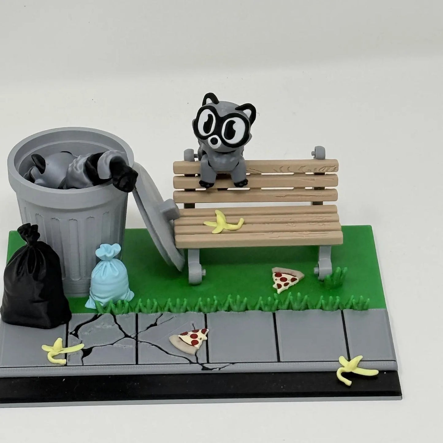 Raccoon With Bench And Trashcan